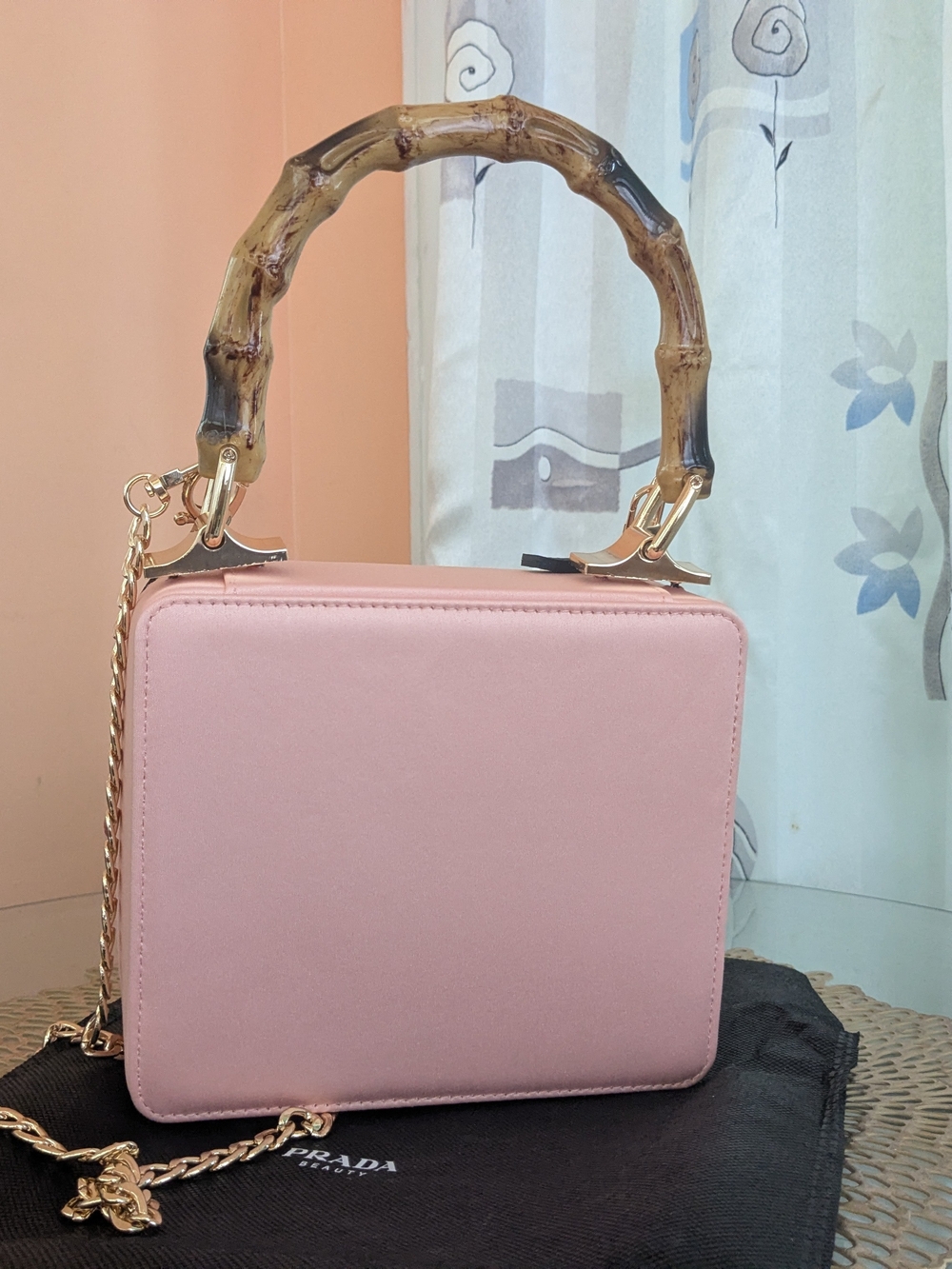 Prada Black Crossbody Bag with Bamboo Handle & Pink Flower Charm - Picture 5 of 9